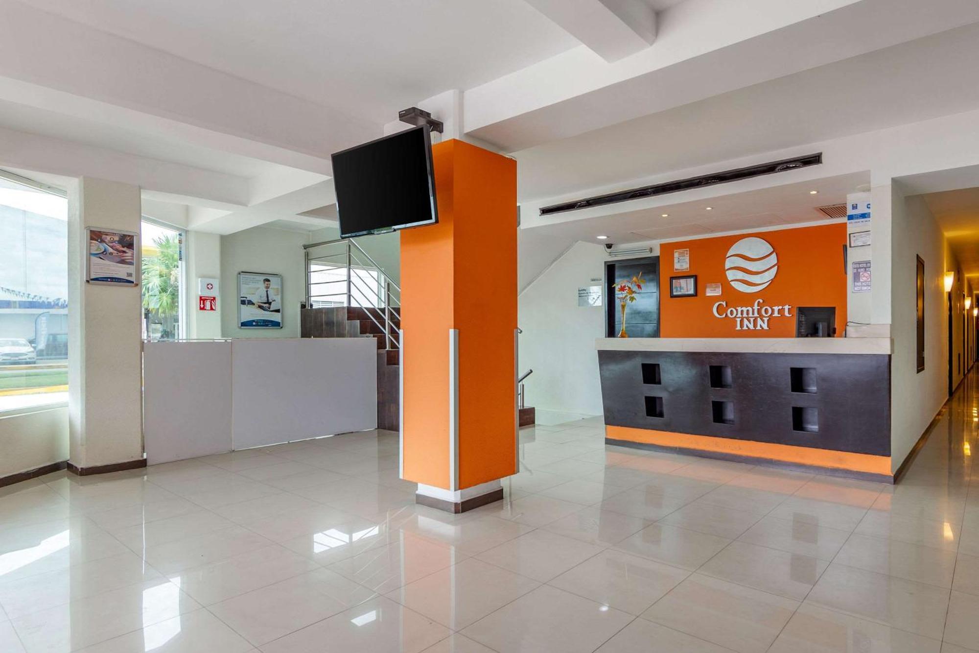 Comfort Inn Cancun Aeropuerto Bagian luar foto
